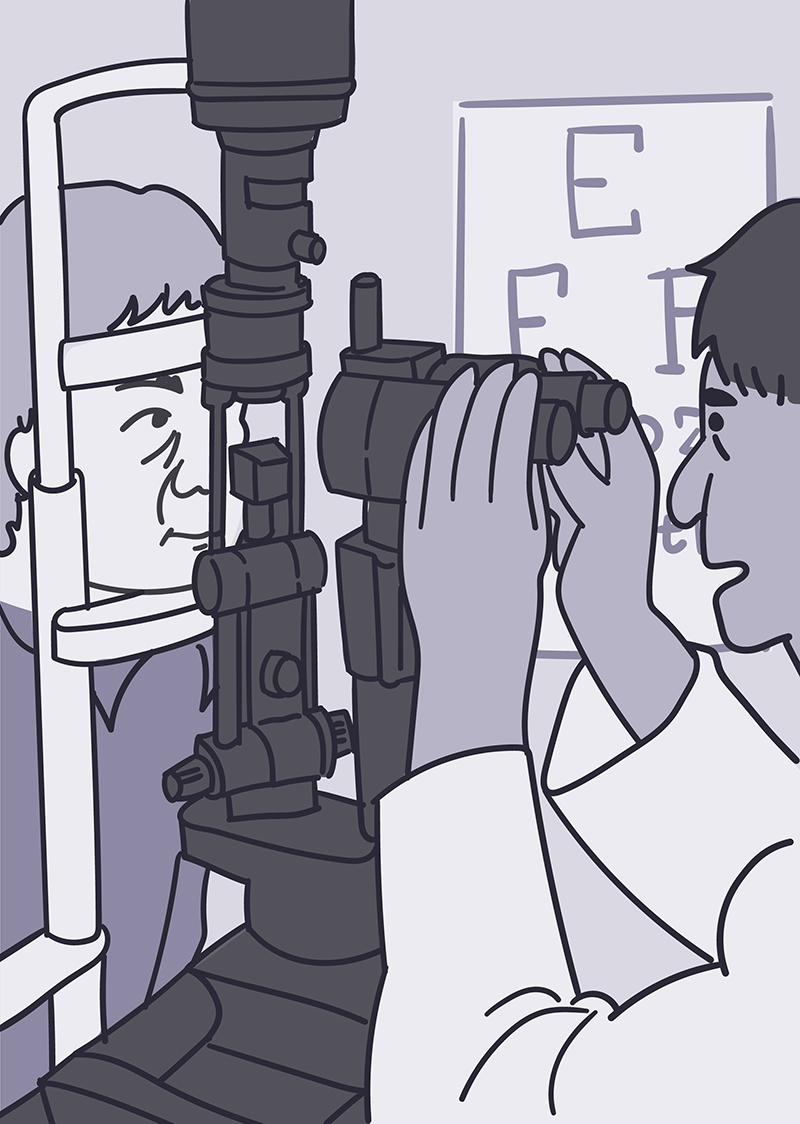 Eye doctor giving person an eye exam.